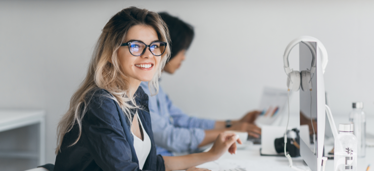 attractive-laughing-freelancer-woman-posing-with-cup-coffee-her-workplace-chinese-student-blue-shirt-works-with-document-campus-with-blonde-friend-glasses Large.png